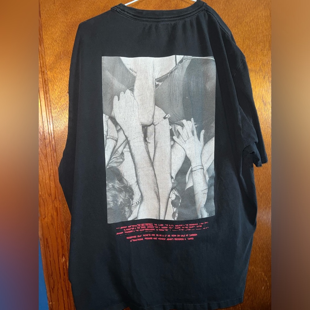 Guess over sized T shirt. Black with graphic design on back. Concert. Vintage